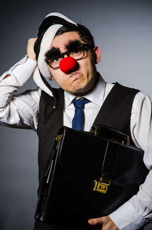 Clown businessman in funny conceptの写真素材