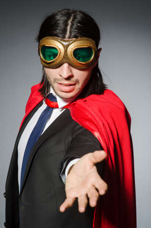 Superman concept with man in red coverの写真素材