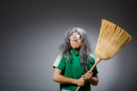 Funny man with brush and wigの写真素材