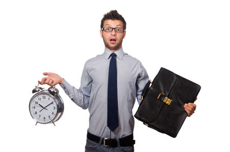 Man with clock trying to meet the deadline isolated on whiteの写真素材