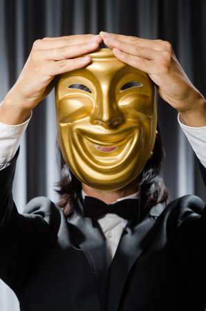 Funny concept with theatrical maskの写真素材