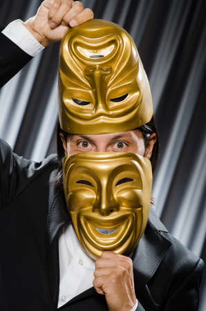 Funny concept with theatrical maskの写真素材