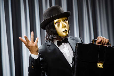 Funny concept with theatrical mask
