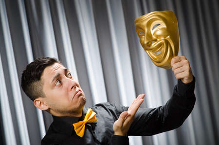 Funny concept with theatrical mask