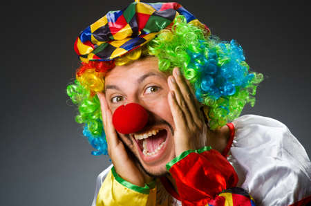 Funny clown in colourful costumeの写真素材