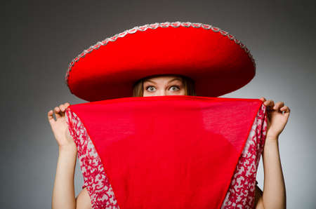 Woman wearing nice red sombreroの写真素材