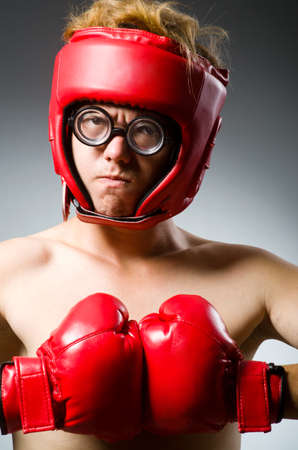 Funny boxer against dark backgroundの写真素材