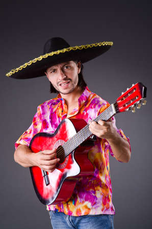Man wearing sombrero with guitarの写真素材