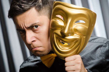 Funny concept with theatrical maskの写真素材