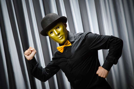 Funny concept with theatrical maskの写真素材