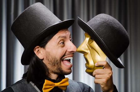 Funny concept with theatrical maskの写真素材