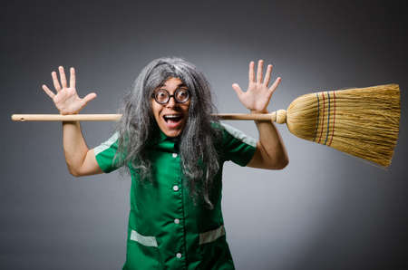 Funny man with brush and wigの写真素材