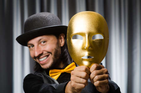 Funny concept with theatrical mask