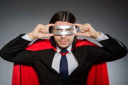 Superman concept with man in red coverの写真素材