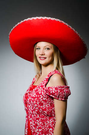 Woman wearing nice red sombreroの写真素材