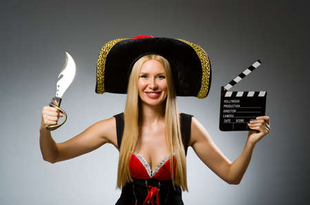 Pirate with movie board and knifeの写真素材