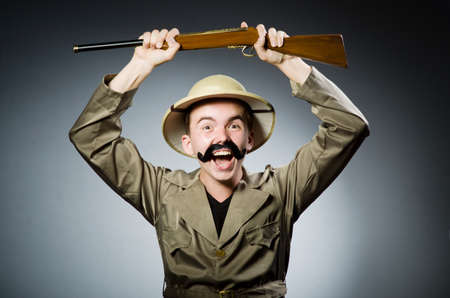 Man in safari hat in hunting conceptの写真素材