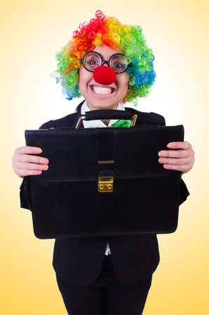 Woman clown businesswoman isolated on whiteの写真素材