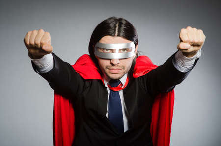 Superman concept with man in red coverの写真素材