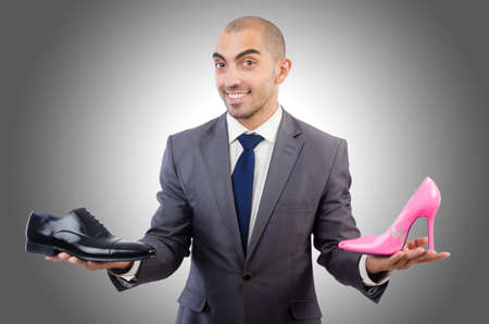 Man with choice of shoesの写真素材