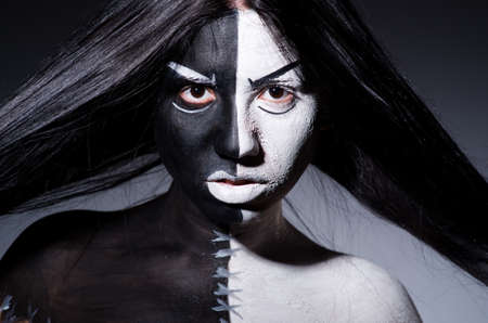 Satan halloween concept with scary womanの写真素材