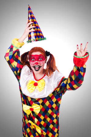 Clown in the costume isolated on whiteの写真素材