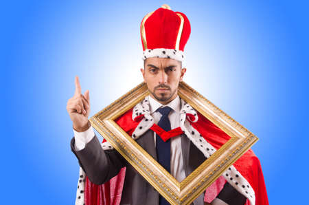 King with picture frame on whiteの写真素材
