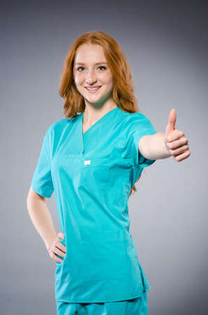 Young woman doctor in medical conceptの写真素材
