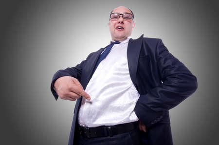 Funny businessman isolated on whiteの写真素材