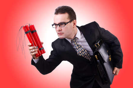 Businessman with dynamite isolated on whiteの写真素材