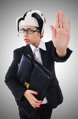 Businessman clown isolated on whiteの写真素材