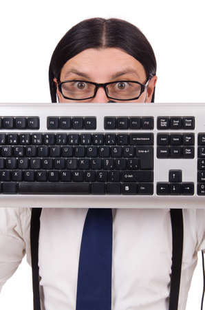 Young funny businessman with keyboard isolated on whiteの写真素材