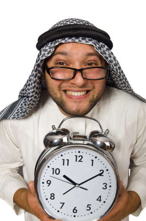 Arab man with clock isolated on whiteの写真素材