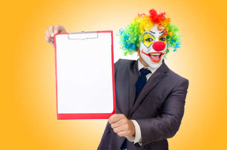 Businessman clown isolated on whiteの写真素材