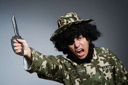Funny soldier in military conceptの写真素材
