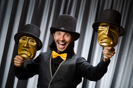 Funny concept with theatrical maskの写真素材