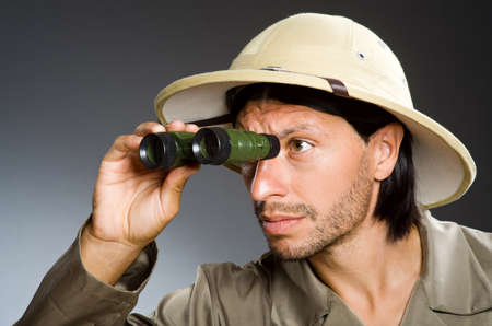 Funny safari hunter against backgroundの写真素材