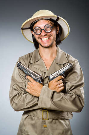Funny safari hunter against backgroundの写真素材
