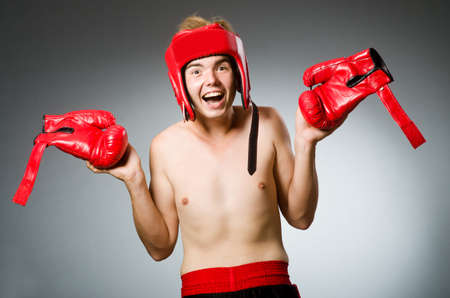 Funny nerd boxer in sport conceptの写真素材