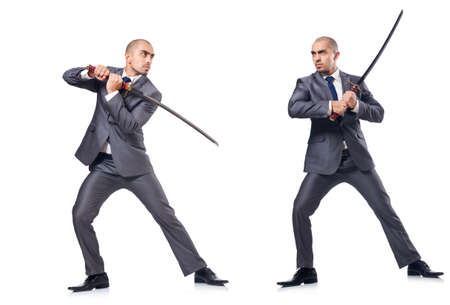 Two men figthing with the sword isolated on whiteの写真素材