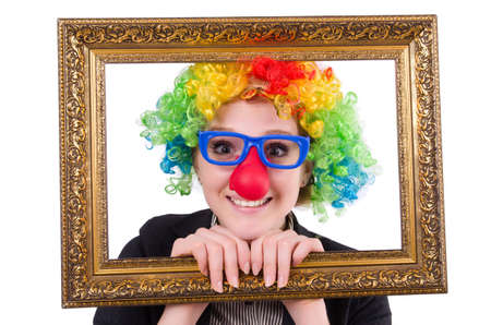 Funny clown girl with frame isolated on whiteの写真素材