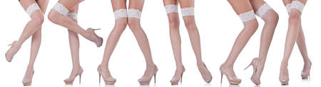 Woman legs isolated on the white background