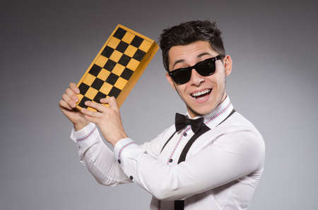 Funny chess player with board