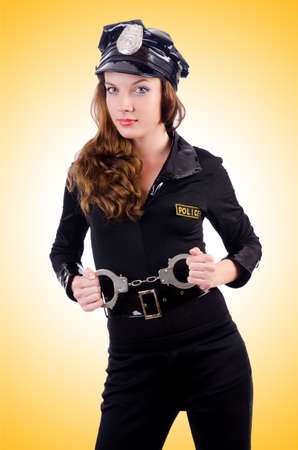 Woman police with handcuffs on whiteの写真素材
