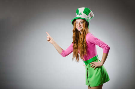 Woman wearing saint patrick hatの写真素材