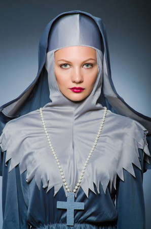 Young nun in religious concept