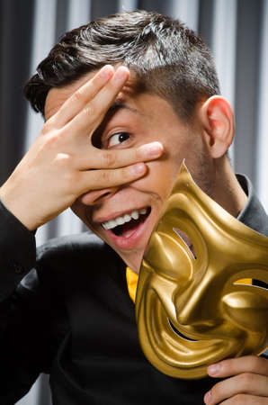Funny concept with theatrical maskの写真素材