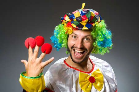 Funny clown in colourful costumeの写真素材