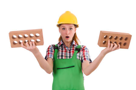 Woman with bricks isolated on white