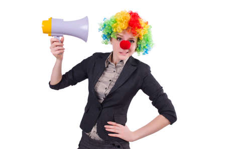 Businesswoman clown with loudspeaker isolated on whiteの写真素材